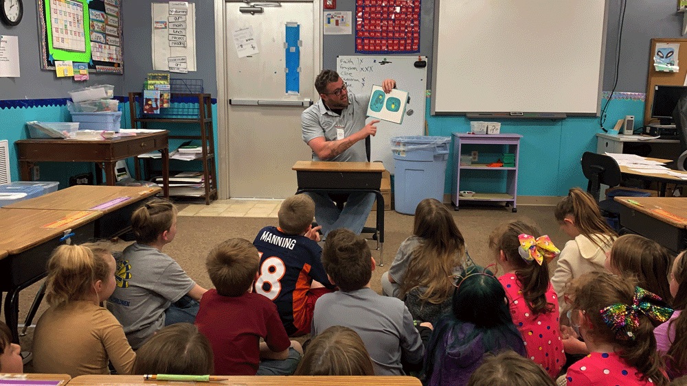 Mike Kerr enjoyed reading Dr. Seuss to children at Turkey Ford School for Read Across America