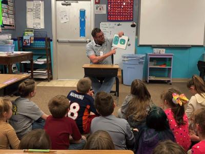 Mike Kerr enjoyed reading Dr. Seuss to children at Turkey Ford School for Read Across America